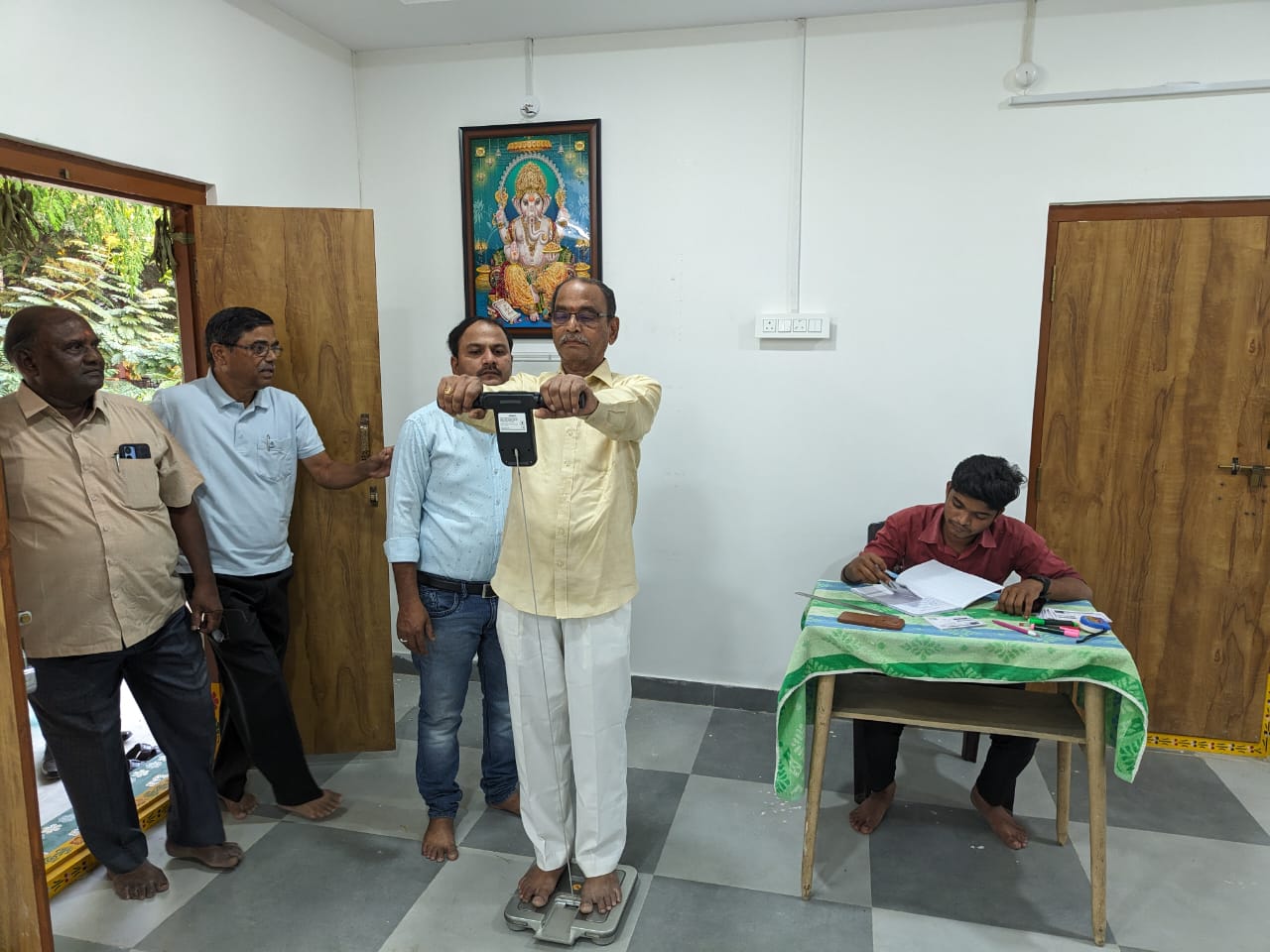 Checking weight and BMI at Wellness Camp on 27-10-2024